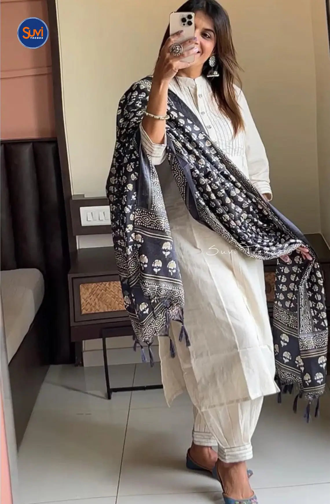 Add a touch of elegance to your wardrobe with our Cotton Pintuck Suit Set in Off White. Made from soft and breathable cotton, this suit set features a mandarin collar and pin tuck detailing for a sophisticated look. The 3/4 sleeves and straight cut add a modern flair, making it perfect for any occasion. Complete the ensemble with the included pant and dupatta. Available online in Malaysia.