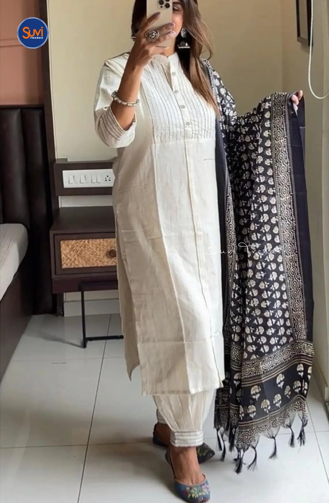 Add a touch of elegance to your wardrobe with our Cotton Pintuck Suit Set in Off White. Made from soft and breathable cotton, this suit set features a mandarin collar and pin tuck detailing for a sophisticated look. The 3/4 sleeves and straight cut add a modern flair, making it perfect for any occasion. Complete the ensemble with the included pant and dupatta. Available online in Malaysia.
