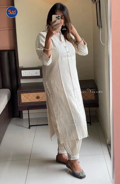 Add a touch of elegance to your wardrobe with our Cotton Pintuck Suit Set in Off White. Made from soft and breathable cotton, this suit set features a mandarin collar and pin tuck detailing for a sophisticated look. The 3/4 sleeves and straight cut add a modern flair, making it perfect for any occasion. Complete the ensemble with the included pant and dupatta. Available online in Malaysia.